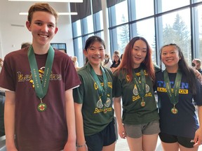 Regina High Schools Athletic Association athletes pose with the gold medals they won Saturday at the Saskatchewan High Schools Athletic Association badminton championships in Rosthern. Shown, from left to right, are Jon Kozak of LeBoldus (boys singles), Jiayan Cau and Jenny Liu of Campbell (girls doubles) and Nataly Eng of O'Neill (girls singles).