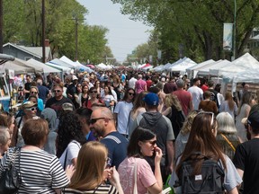 Pedestrians crowd the street during the 2019 Cathedral Village Arts festival on 13th Avenue. The festival returns to in-person events this year.