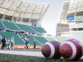 Saskatchewan Roughriders defenseman Zach Herzog, 29, performs a drill during warm up for Tuesday's preseason game against the Winnipeg Blue Bombers at Mosaic Stadium.