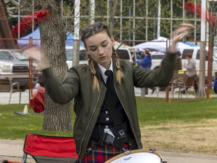  Margaret Parsons, of the Saskatoon Police Pipes & Drums, warms up on the tenor drum before performing at the Saskatchewan Highland Games and Celtic Festival held in Victoria Park on Saturday, May 21, 2022 in Regina.
