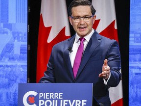 Candidate Pierre Poilievre makes a point at the Conservative Party of Canada English leadership debate in Edmonton, Alta., Wednesday, May 11, 2022. Poilievre is denouncing the "white replacement theory" that is believed to be a motive for a mass shooting in Buffalo, N.Y., over the weekend as "ugly and disgusting hate mongering."