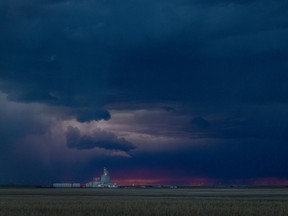 This file image shows a lightning strike in the west sky as the sun set on Mother's Day on Sunday, May 8, 2022 in Regina.