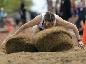 Martin's Brianna Shupe, shown competing in the long jump Wednesday at the Canada Games Athletics Complex, was a co-winner of the intermediate girls aggregate title at the Regina High Schools Athletic Association track and field championships.