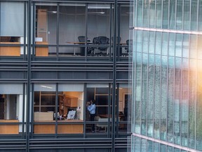 A person works in an office building in San Francisco.