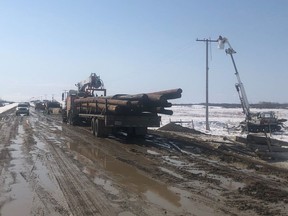 SOUTHEAST, SASK : April 27, 2022 -- SaskPower crews working to restore power to the province's southeast after spring storms are contending with water-logged, mucky roads.
