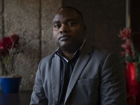 Justin Nyee, the uncle of Samwel Uko, who was found dead in Wascana Lake on May 21, 2020 having previously sought care twice at the Regina General Hospital before being escorted out by security, sits for a portrait at the Ramada Plaza on Monday, May 30, 2022 in Regina.