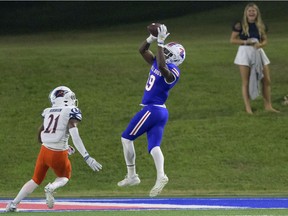 Louisiana Tech wide receiver Samuel Emilus, 19, scores a touchdown against UTSA cornerback Ken Robinson on Oct. 23 in Ruston, La. Emilus was the Roughriders' first-round pick in the 2022 CFL draft.