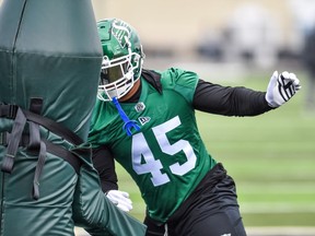 Roughriders defensive end Pete Robertson, shown at training camp, is to be sidelined four to six weeks with a severe mid-foot sprain.