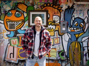 Devin Heroux stands for a photo in an alley on Broadway Avenue in Saskatoon, May 9, 2022.