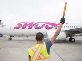 The Swoop Boeing 737-800 arrives at the gate to the Regina International Airport Tarmac for its first flight out of Regina on Thursday, June 16, 2022 in Regina.