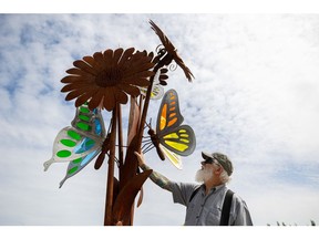 Metal artisan Murray Cook admires his work during the unveiling of the new Humboldt Broncos memorial garden outside the Humboldt District Health Complex. Photo taken in Saskatoon, Sask. on Wednesday, June 22, 2022.