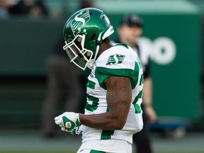 Saskatchewan Roughriders' Jamal Morrow (25) celebrates scoring a touchdown on the Edmonton Elks on Saturday.