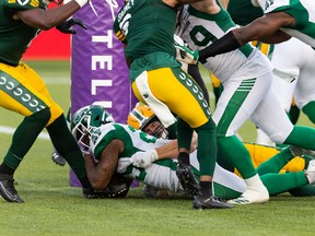 Saskatchewan Roughriders' Jamal Morrow (25) scores a touchdown during Saturday's 26-16 win over the Edmonton Elks.