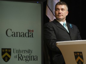 Nicholas Carleton, researcher, looks on during a press conference at the University of Regina. The announcement revealed a $20 million boost in support the mental health of frontline health care workers and public safety personnel, both areas of research for Carlton.