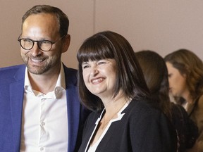 Outgoing leader of the Saskatchewan NDP Ryan Meili, left, poses for a photo with newly elected leader Carla Beck at the leadership convention at the Delta Hotel on Sunday, June 26, 2022 in Regina.