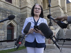speaks with reporters outside West Block in the Parliamentary precinct, Friday, June 3, 2022 in Ottawa.
