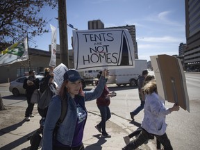 A group calling themselves "advocates, allies and those needing housing" walked to Social Services offices in Regina on Monday, April 4 to press upon Social Services Minister Lori Carr the shortcomings in the Saskatchewan Income Support (SIS) program, and the needs of those who are houseless in Regina.