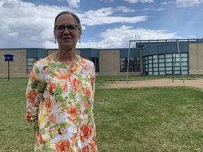Saskatoon Public Schools board chair Colleen MacPherson stands outside ?cole Silverspring School. The division says it faced another year of difficult decisions as the board balanced the budget while contending with a $4.5-million funding shortfall. Photo taken in Saskatoon, Saskatchewan on June 8, 2022. (Amanda Short/Saskatoon StarPhoenix).