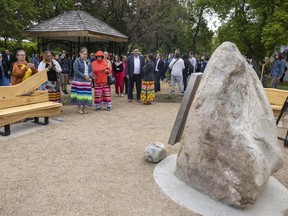 A large gathering attend a ceremony for the Saskatchewan Residential School Memorial on the grounds of Government House on Tuesday, June 21, 2022 in Regina.