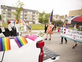 The Camp Fyrefly float riding down Albert street during Queen City Pride Parade on Saturday, June 11, 2022 in Regina.