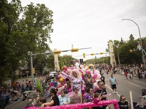 Drag Queen Flo Mingo rides on her float for LuLu's lodge on Albert Street during the Queen City Pride Parade on Saturday, June 11, 2022 in Regina.