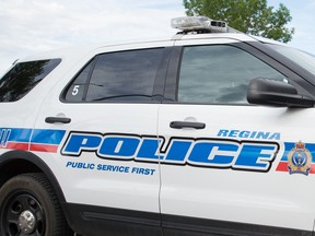 Regina police have charged a man in connection with a collision involving a young cyclist, who wasn't physically injured.