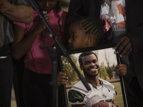 Various trophies and accolades attributed to Samwel Uko, sits on a table in front of his family at a press conference held during a coroner's in the death of 20-year-old Samwel Uko. He was found dead in Wascana Lake on May 21, 2020 having previously sought care twice at the Regina General Hospital before being escorted out by security.