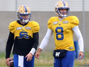 Winnipeg Blue Bombers quarterback Zach Collaros (right) returned to practice on Tuesday, June 14, 2022 after being pulled late in the game Friday by an injury spotter, with backup Dru Brown driving the ball for the winning points.