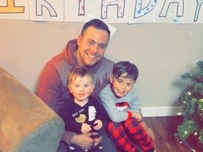 Ryan Booker, pictured with his two sons, was the subject of a police-involved shooting near Belle Plaine on July 18, 2022.