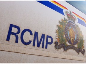 The RCMP logo is seen in this photo of the side of a police vehicle.