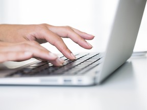 Stock image of a woman typing on a laptop computer. Getty Images/iStock Photo