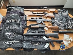 Police seized $12,700 cash, seven firearms and ammunition, 320 grams of cocaine, 19 grams of methamphetamine, six motorcycles and five vehicles as the result of a gang unit investigation.