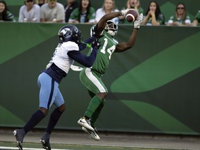 Roughriders receiver Tevin Jones hauls in a 10-yard Jake Dolegala pass for a touchdown Sunday against Toronto.