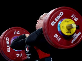 Alexis Ashworth cleans and jerks during the women's 71kg weightlifting final at the Commonwealth Games in Birmingham, England on Monday.
