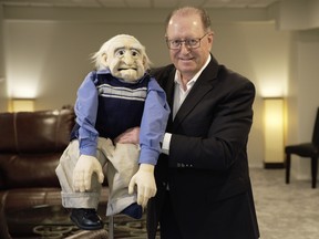Doug Arden, a 25-year professional ventriloquist and magician, poses with his dummy Gramps.