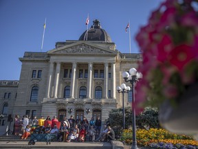 Supporters of Dawn Walker, who is currently being held in the United States for charges, gathered outside the Saskatchewan Legislative Building for a rally on Tuesday, August 9, 2022 in Regina to press for her extradition to Canada.