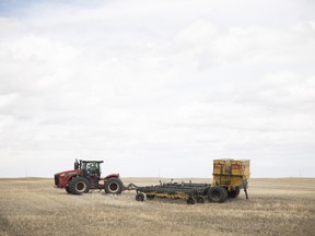 Kyle Schmalenberg drives a tractor across one of his fields to seed peas during the beginning of the farming season on Friday, May 6, 2022 near Serath. KAYLE NEIS / Regina Leader-Post
