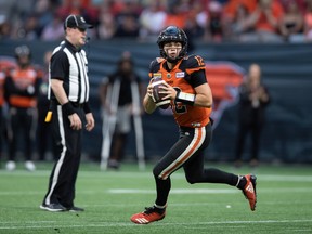 B.C. Lions quarterback Nathan Rourke is shown Saturday night, when he threw five touchdown passes — all in the first half — in a 46-14 victory over the visiting Edmonton Elks.