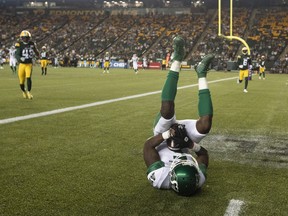 Saskatchewan Roughriders wide receiver Duke Williams (5) scores a touchdown against the Edmonton Elks during second half CFL action in Edmonton on Saturday.