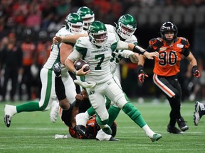 Saskatchewan Roughriders quarterback Cody Fajardo runs for some of the 38 yards he gained on six carries against the host B.C. Lions on Friday.