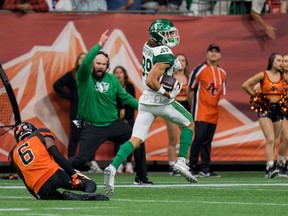 The Saskatchewan Roughriders' Kian Schaffer-Baker, shown scoring a touchdown on an 85-yard reception against the B.C. Lions on Aug. 26, was informed on Wednesday that he was — and was not — a CFL West Division all-star.