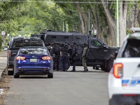 Members of the Regina Police Service and RCMP tactical teams were on the 1400 block of Garnet Street on Thursday, August 11, 2022.