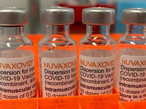 Four vials with the "Nuvaxovid" COVID-19 vaccine
