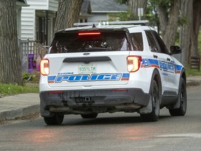 Regina police have charged two men with weapons charges after a Monday incident on the 2100 block of Broad Street.