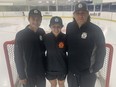 Sydney Daniels (centre) stands with her father, former NHLer Scott Daniels (left) and cousin Colby Daniels.