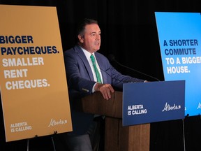 Alberta Premier Jason Kenney speaks during a press conference in Calgary about a new campaign to attract workers to the province, on Aug. 15.