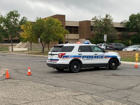 F.W. Johnson Collegiate was placed in lockdown on Friday, September 23. A Regina Police Service vehicle is parked nearby.