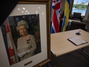 A book of condolence sits at City Hall as a tribute and commemoration of Queen Elizabeth II on Friday, September 16, 2022 in Regina.