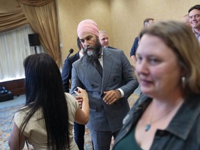 New Democratic Party Leader Jagmeet Singh greets party members at the beginning of the NDP caucus retreat in Halifax on Wednesday, Sept. 7, 2022. Singh says during this fall's sitting of Parliament the NDP will keep pushing the governing Liberals to move on dental care and housing support as laid out in the deal between the two parties.THE CANADIAN PRESS/Darren Calabrese