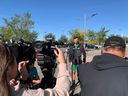 Saskatchewan Roughriders quarterback Jake Dolegala prepares to face the media outside Mosaic Stadium on Monday.